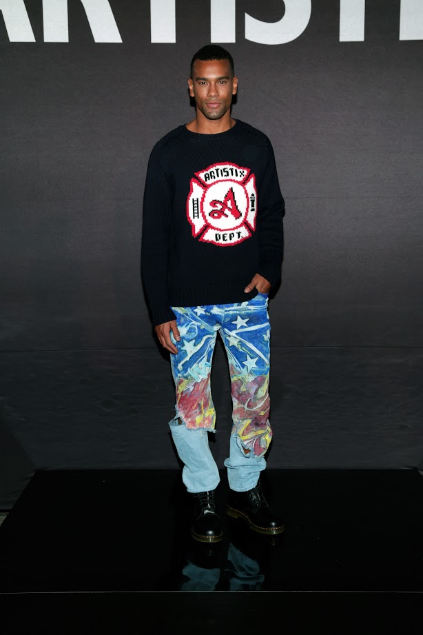 Look # 2 Jason- ARTISTIX Fire Dept. Signature Sweater Stars & Stripes; ARTISTIX Indigo Jean (Photo by Lars Niki/Getty Images for ARTISTIX)